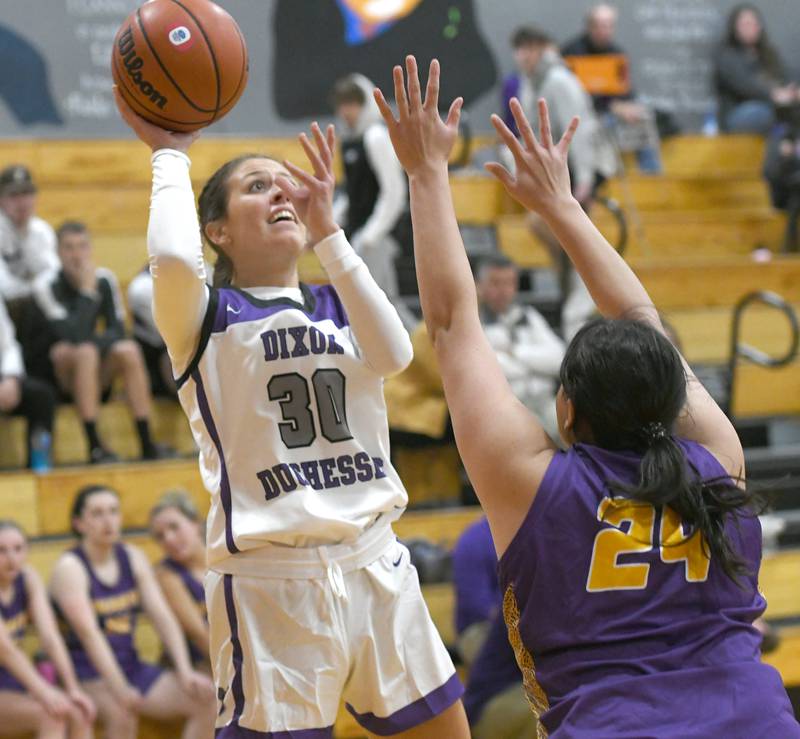 Dixon's Harvest Day shoots against Mendota at the Oregon Tip Off Tournament on Wednesday. Nov. 26.