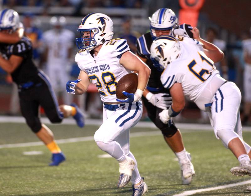 Wheaton North’s Max Serbick runs the ball during a game Friday, Sept. 13, 2024 at St. Charles North.