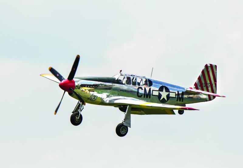 The P-51 Mustang "Betty Jane" lands at the Whiteside County Airport on Thursday morning after flying a round trip to Savannah from Rock Falls. The Wings of Freedom tour at the Whiteside County Airport gave visitors a chance to see real World War II planes up close and personal, talk to their flight crew members, and even get a ride in a plane.