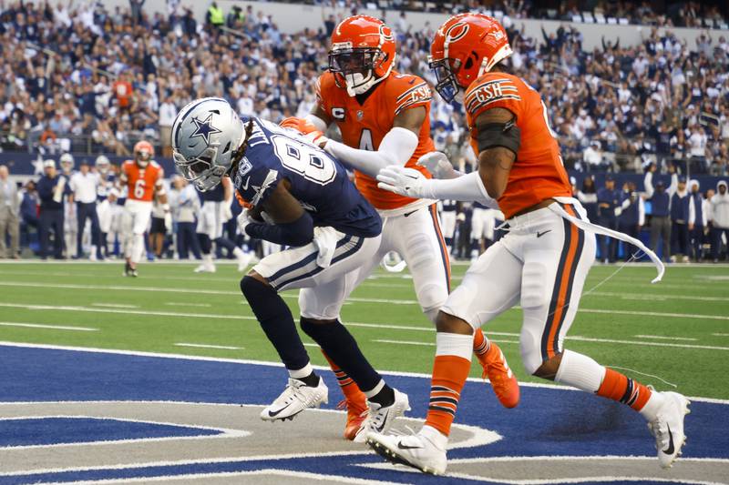 Dallas Cowboys' CeeDee Lamb catches a touchdown pass during the first half against the Chicago Bears, Sunday, Oct. 30, 2022, in Arlington, Texas.