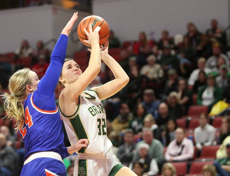 St. Bede's Quinn McClain drives to the basket as Okawville's Marly Tillman defends during the Class 1A State semifinal game on Thursday, Feb. 29, 2024 at CEFCU Arena in Normal.