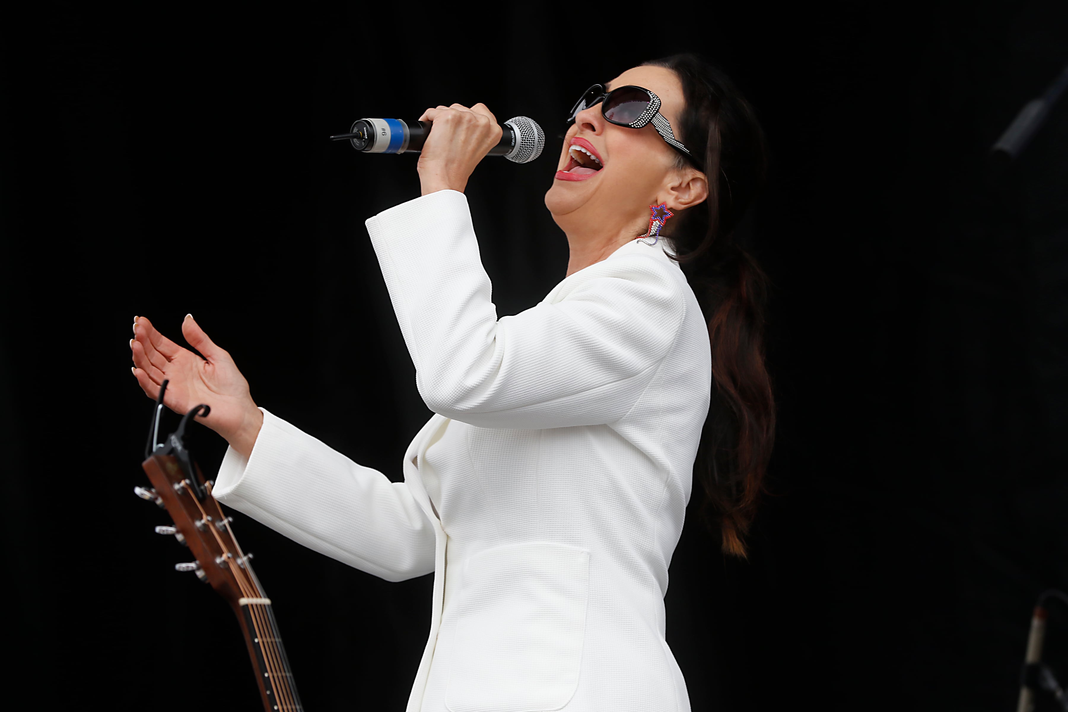 Diva Montell sings the “National Anthem” during the Trump Now-Save the American Dream Rally at the McHenry County Fairgrounds on Sunday Aug. 18, 2024, in Woodstock.