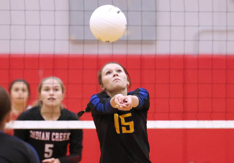 Somonauk's Josie Rader bumps the ball during their regional first round match against Indian Creek Tuesday, Oct. 25, 2022, at Aurora Christian High School in Aurora.