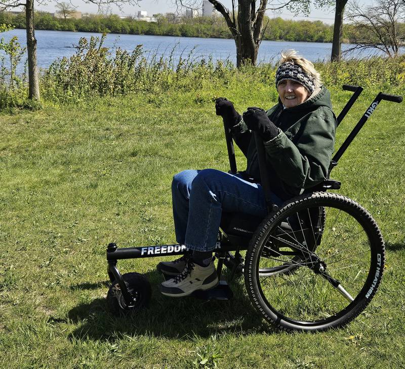 Kim Kosmatka of Mokena was the first person to test the new GRIT Freedom Chair at the Forest Preserve District of Will County’s Four Rivers Environmental Education Center in Channahon. The wheelchair is available for public use at no cost.