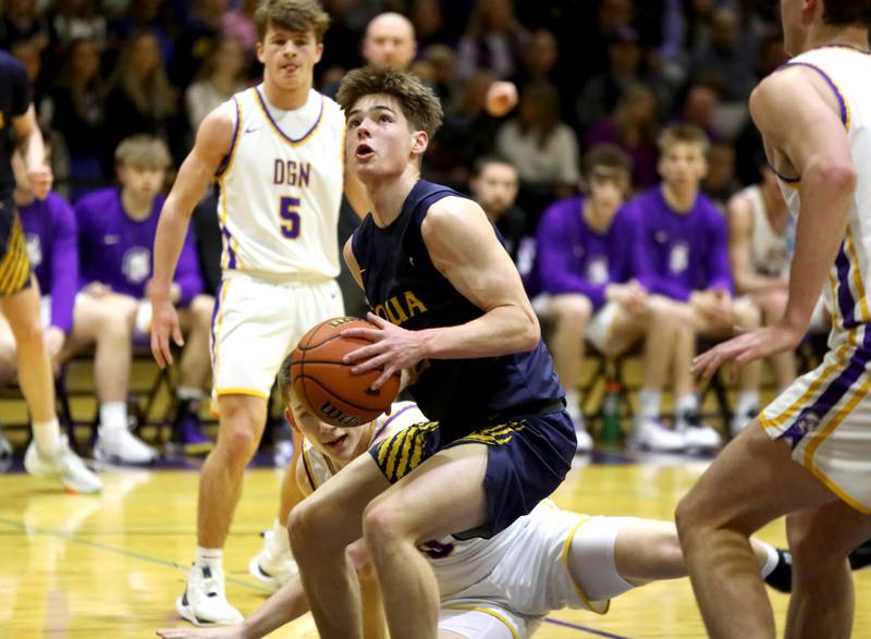 Neuqua Valley’s Luke Kinkade looks for an opening from under the basket during the Class 4A Downers Grove North Regional final against Downers Grove North on Friday, Feb. 23, 2024.