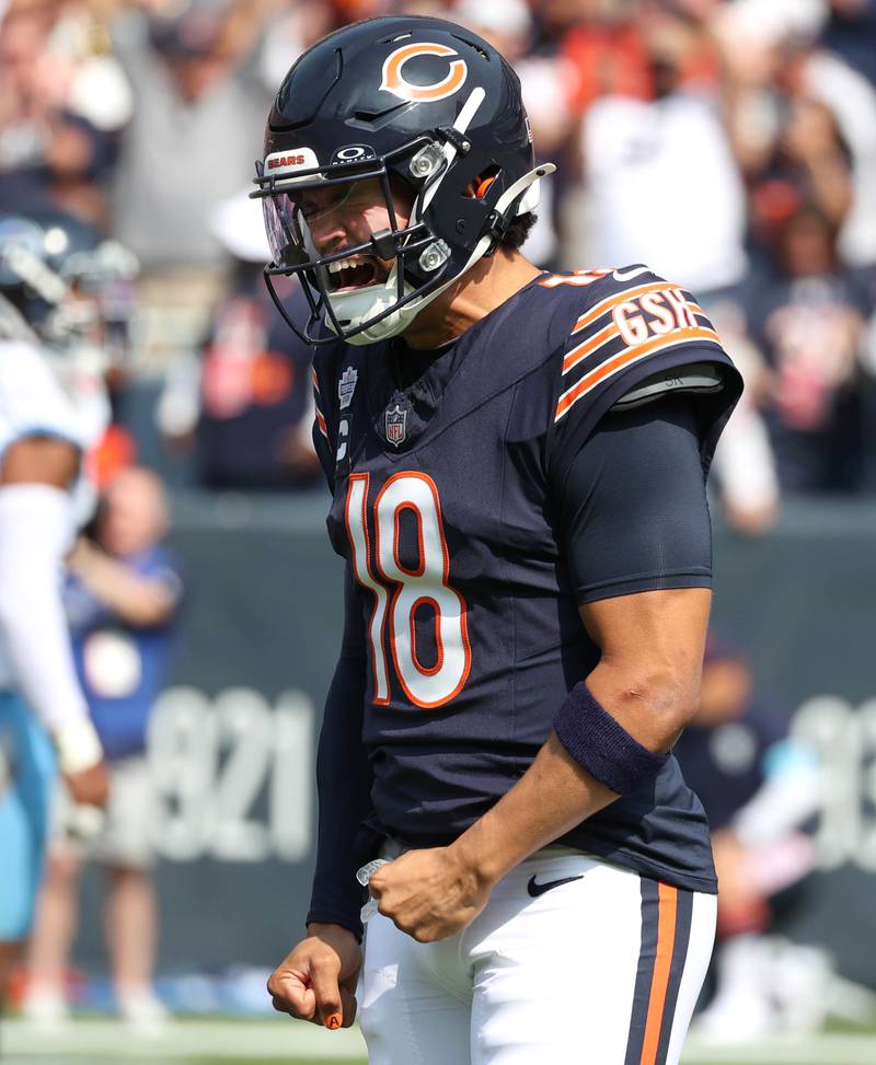 Chicago Bears quarterback Caleb Williams celebrates a first down during their game against the Tennessee Titans Sunday, Sept. 8, 2024, at Soldier Field in Chicago.