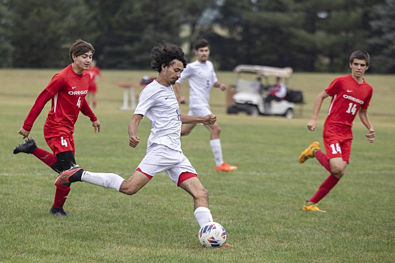 Dixon’s Kristian Prather loads up before scoring Monday, Sept. 11, 2023 in Oregon.