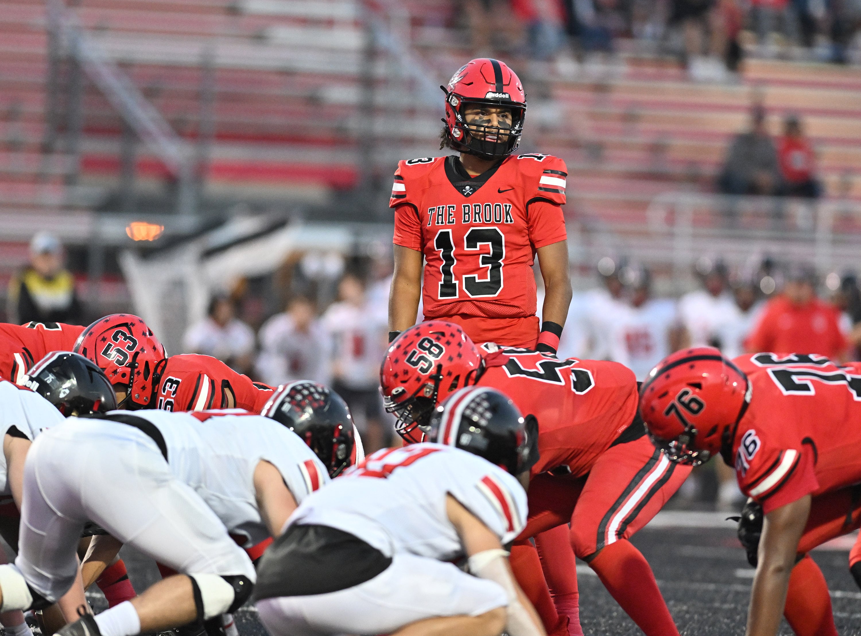 Bolingbrook's Jonas Williams looks to the sideline for play instructions during a non-conference game against Lincoln-Way Central on Friday, Sep. 29, 2023, at Bolingbrook. (Dean Reid for Shaw Local News Network)