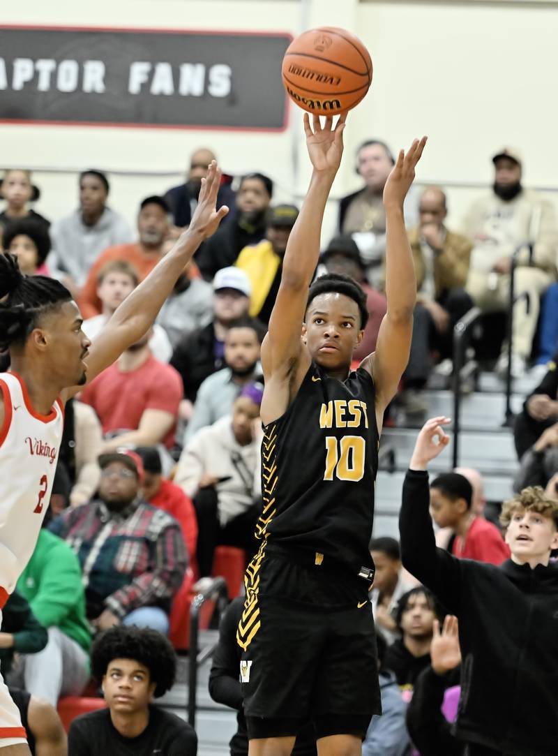 Joliet West's Zion Gross shoots a 3-point shot  during the Class 4A sectional semifinal against Homewood Flossmoor at Rich Township on Tuesday, Feb. 27, 2024, at Richton Park. (Dean Reid for Shaw Local News Network)