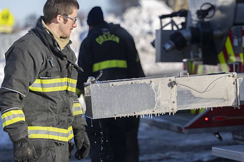 Frigid temps made for an icy job fighting the fire Tuesday, Jan. 16, 2024.