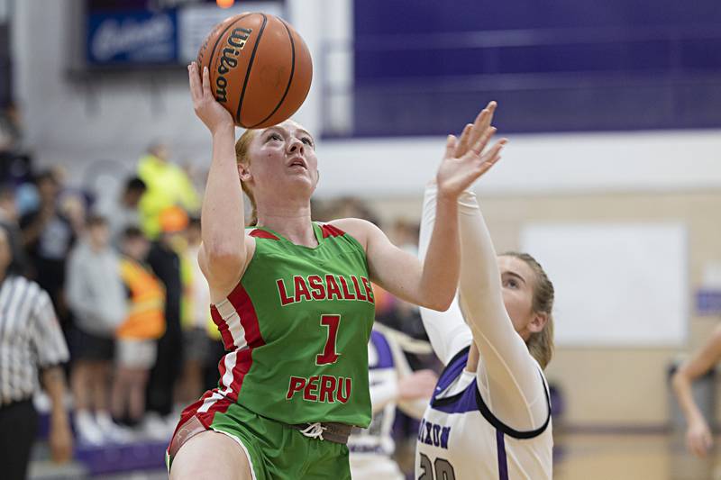 LaSalle-Peru’s Addison Duttlinger puts up a shot against Dixon Thursday, Nov. 30, 2023 in Dixon.