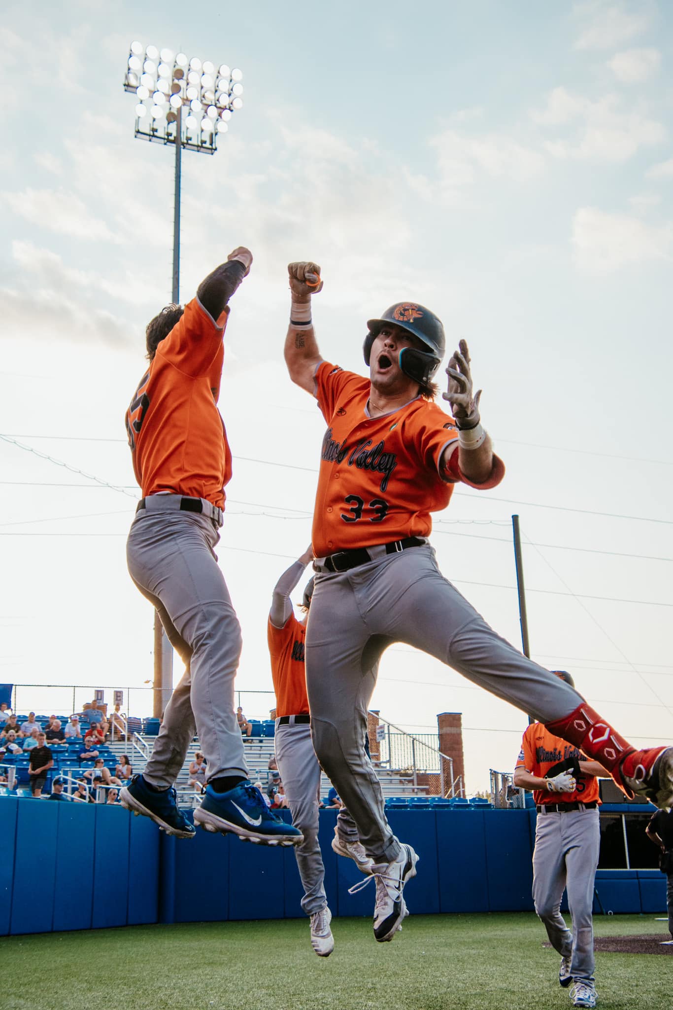 Pambos Nicoloudes (33) celebrates with Kyle Gibson after hitting a grand slam during the Illinois Valley Pistol Shrimp's 13-8 victory over Rex Baseball during Game 1 of the Prospect League Championship Series on Monday, Aug. 5, 2024 in Terre Haute, Ind.