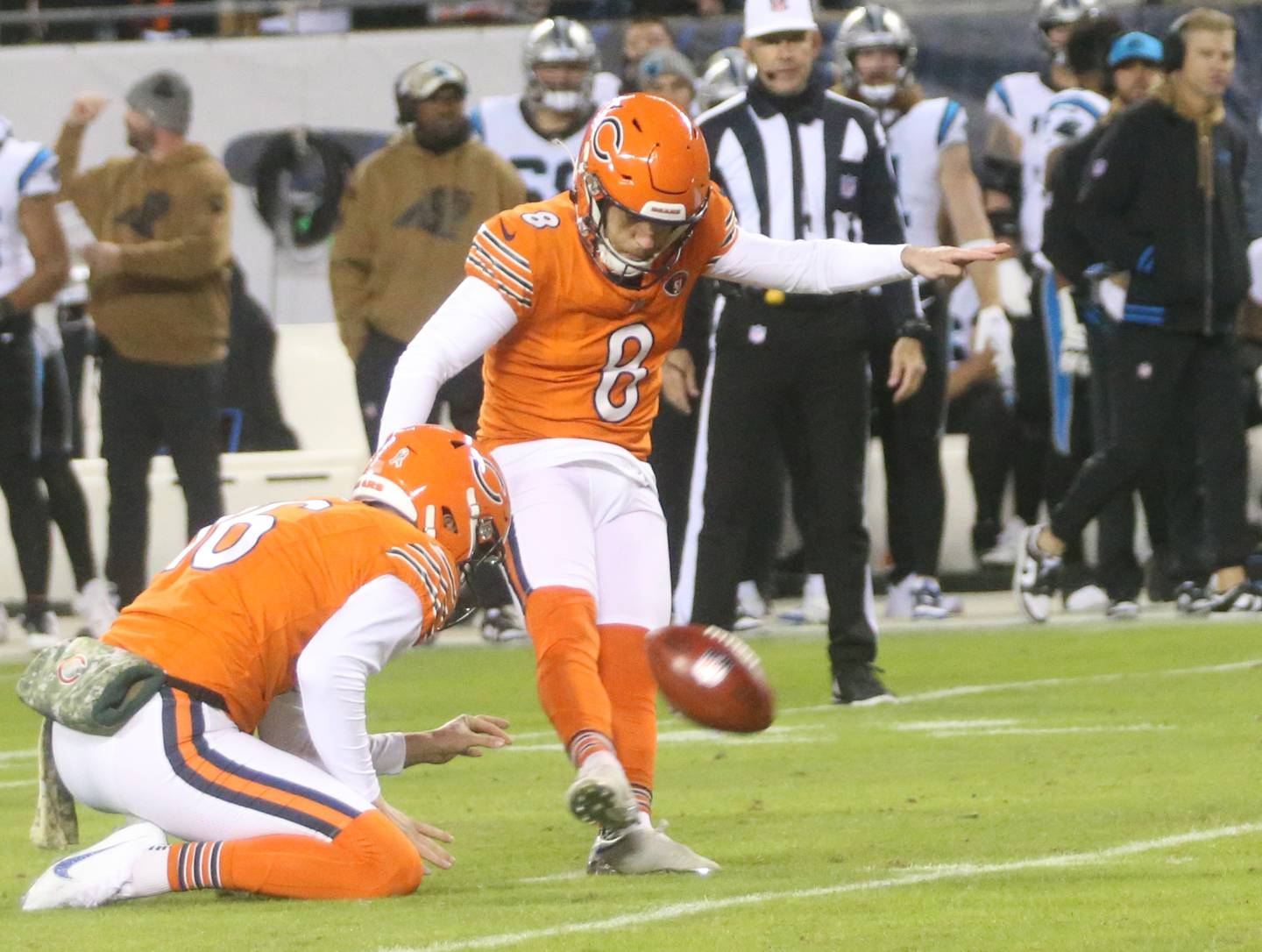 Chicago Bears field goal kicker Cairo Santos hits a field goal before halftime as punter Trenton Gill holds the ball on Thursday, Nov. 9, 2023 at Soldier Field.