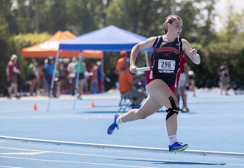 Forreston’s Elsa Monaco takes off in the 1A 4x200 Saturday, May 18, 2024 at the IHSA girls state track meet in Charleston.