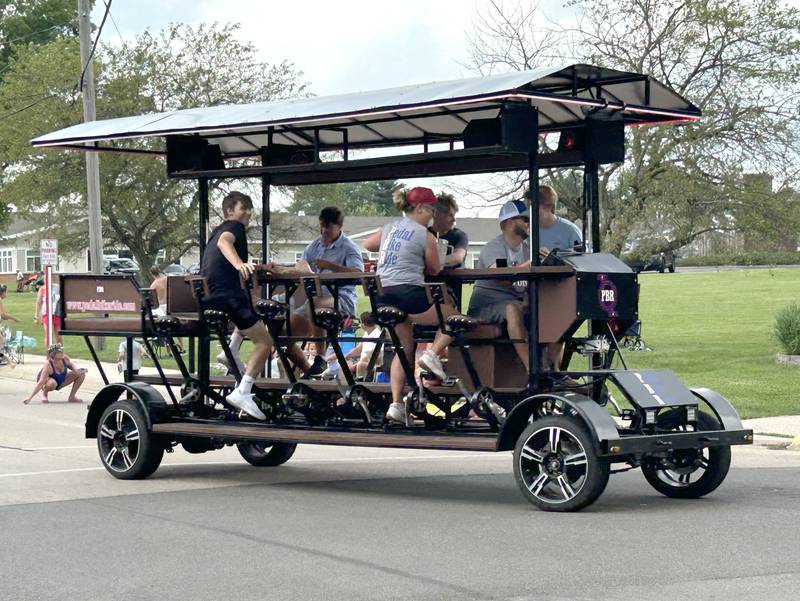 A peddle bike ride was one of the entries in the ByronFest parade on Saturday, July 13, 2024 in Byron.