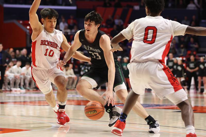 Glenbard West’s Bobby Durkin drives to the basket against Bolingbrook in the Class 4A semifinal at State Farm Center in Champaign. Friday, Mar. 11, 2022, in Champaign.