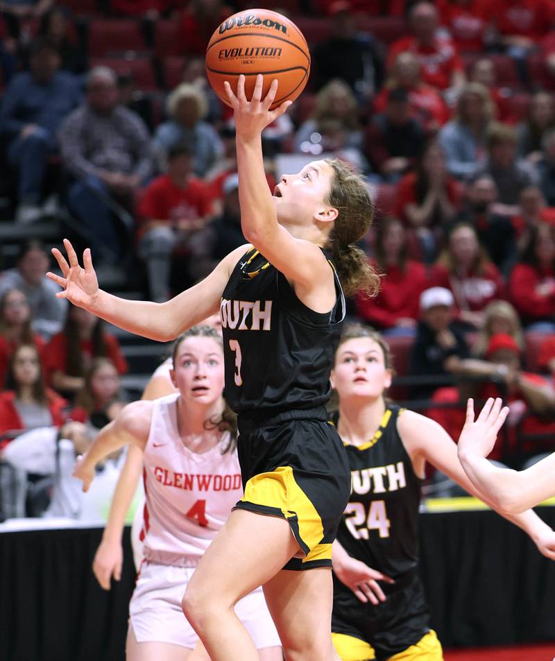 Hinsdale South's Brynn Diedrich gets a layup in front of Glenwood's Ava Bobb during their game Friday, March 1, 2024, in the IHSA Class 3A state semifinal at the CEFCU Arena at Illinois State University in Normal.
