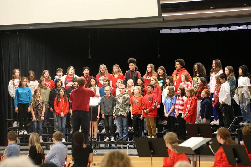 Parkside School fifth and six grade choir sings "Sounds of America" during the Parkside School Veterans Day Program on Friday, Nov. 10, 2023 at Parkside Middle School in Peru.