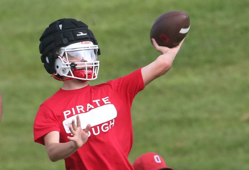 Ottawa quarterback Mark Munson throws a pass against St. Bede during a 7-on-7 meet on Wednesday, July 24, 2024 at Ottwaa High School.