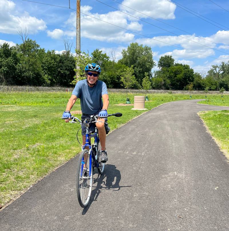 Bruce Wilczynski of Crest Hill rides along the Plainfield riverfront trail. “I hope they continue to expand. It is a plus for a city to be bicycle and pedestrian friendly. It attracts new people to the community.”