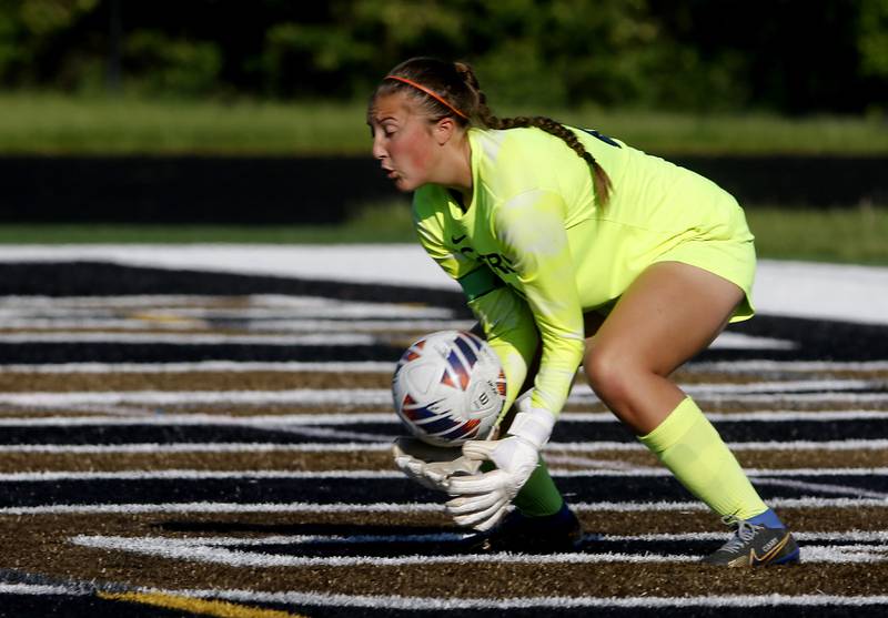 Crystal Lake Central's Addison Cleary grabs a shot on goal during the IHSA Class 2A Grayslake North Regional championship soccer match against Wauconda on Friday, May 17, 2024, at Grayslake North High School.