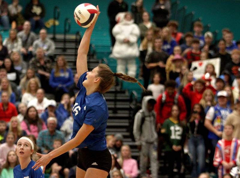 Woodstock’s Hallie Steponaitis hits the ball against Prairie Ridge in IHSA Class 3A sectional semifinal volleyball action at Woodstock North Monday.