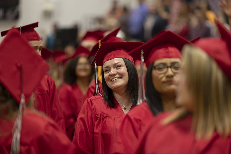 Graduates smile at loved ones after walking into the SVCC gym Friday, May 10, 2024 for the 2024 commencement ceremony.