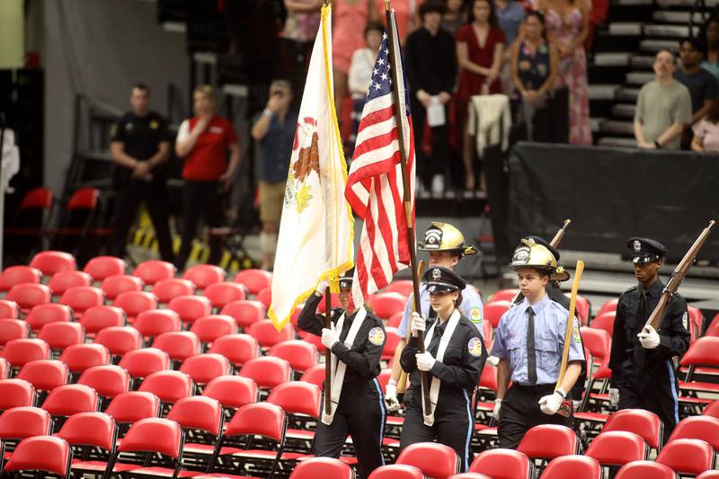 Members of the Fox Valley Career Center Senior Fire Science Color Guard present the colors during the Kaneland High School 2024 Commencement Ceremony at Northern Illinois University in DeKalb on Sunday, May 19, 2024.