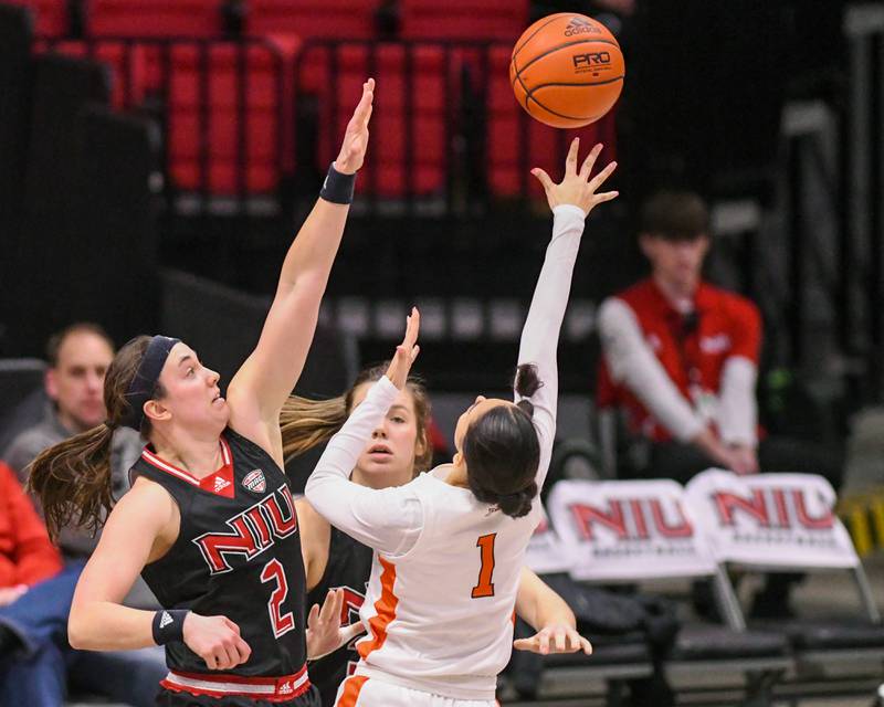 Northern Illinois's Sidney McCrea (2) tries to defend Bowling Green's Amy Velasco (1) during the first half of the game on Saturday Feb. 24, 2024, held at The Convocation Center in DeKalb.