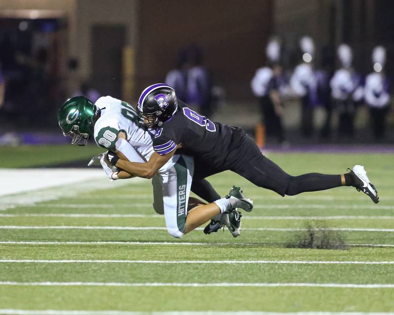 Downers Grove North's Oliver Thulin (10) runs down the sidelines after a catch during a football game between Glenbard West at Downers Grove North on Friday, Sept 13th, 2024  in Downers Grove.