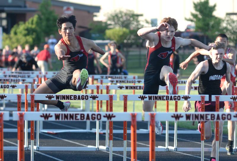 Forreston's Lucas Nelson (left) and Eli Ferris (right) race to the finish line of the 110 hurdles at the 1A Winnebago Sectional on Friday, May 17, 2024 in Winnebago. Nelson took first in 16.32 seconds  and Ferris second in 16.34. Both advanced to the state finals in Charleston.