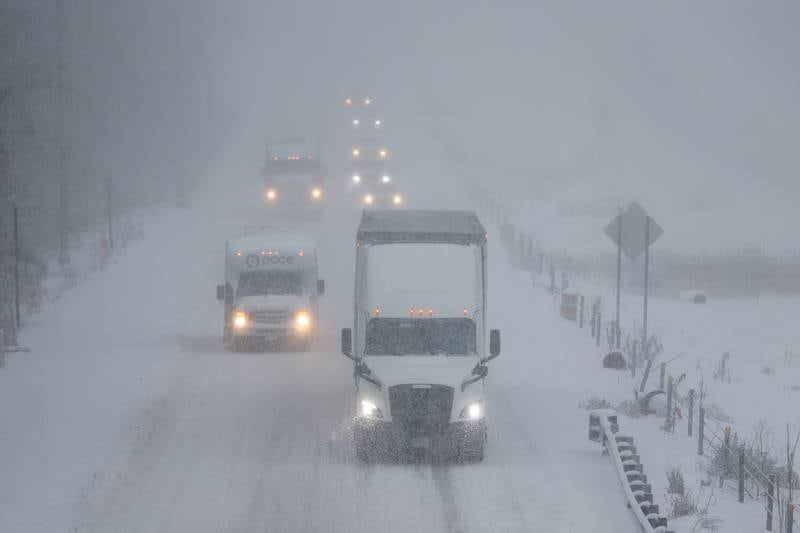 Traffic moves along slowly on east bound I-80 early Wednesday morning. Wednesday, Feb. 2, 2022, in Joliet.