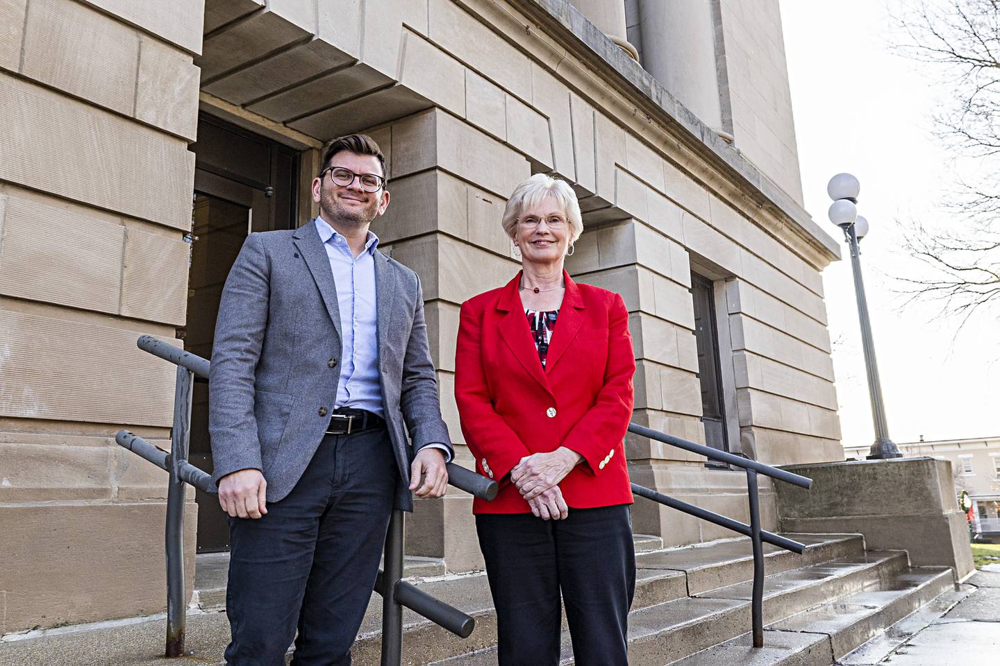 Outgoing Lee County Administrator Wendy Ryerson welcomes Jeremy Englund to the position.