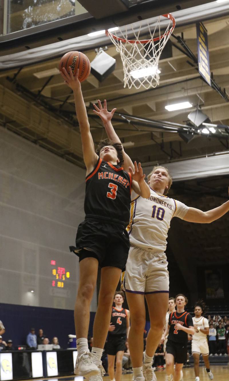 McHenry's Marko Stojich shoots the ball in front of Hononegah's Cole Warren during the IHSA Class 4A Guilford Boys Basketball Sectional semifinal game on Wednesday, Feb. 28, 2024, at Rock Valley College in Rockford.