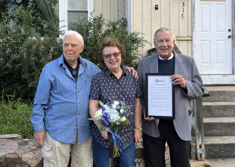 Batavia Mayor Jeff Schielke (Right) proclaimed Sept. 6 as Ronn and Pat Pittman Day in honor of the couple's 65th wedding anniversary, outside the former Christian Church at 316 E. Wilson St. in Batavia, where they were married in 1959.