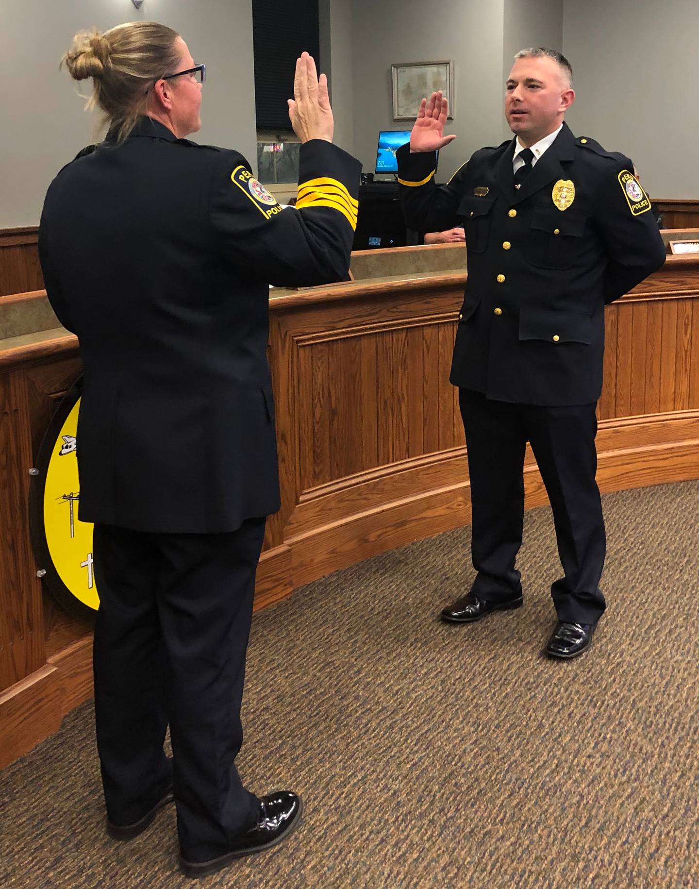 Peru Police Chief Sarah Raymond swears in Art Smith as patrol lieutenant Monday, Feb 27, 2023 at City Hall.