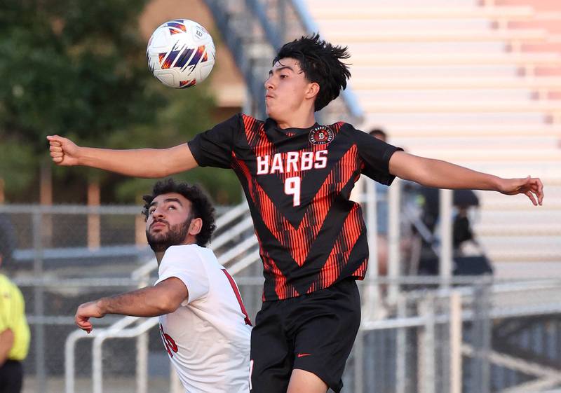 DeKalb's Joaquin Medina-Benitez gets to the ball over Rockford East's Oday Alhariri during their game Thursday, Sept. 12, 2024, at DeKalb High School.