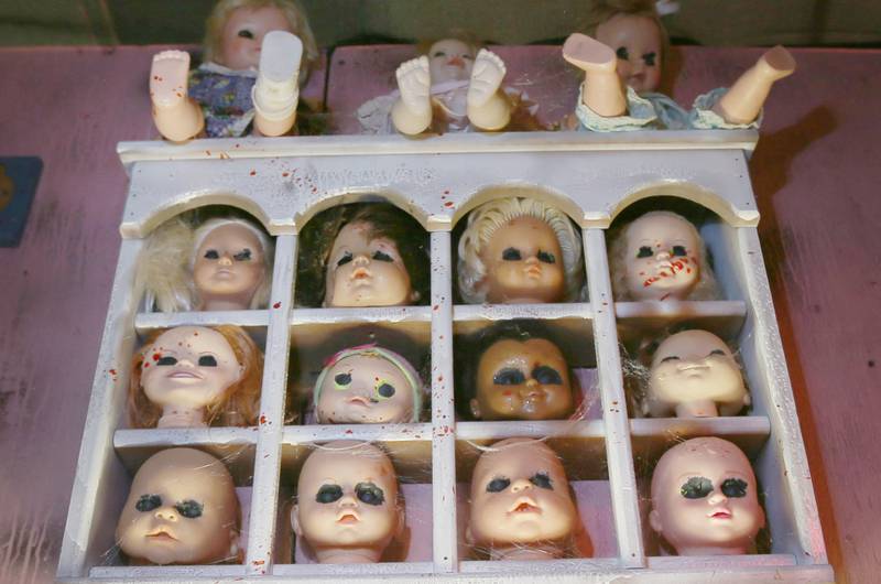 A photo of dolls spattered in fake blood inside the Insanity Haunted House at the Peru Mall on Thursday, Oct. 6, 2022. The haunted attraction is more than 10,000 square feet and has earned multiple houses in Illinois, including No. 2 in the state in 2021 and No. 3 in 2020.