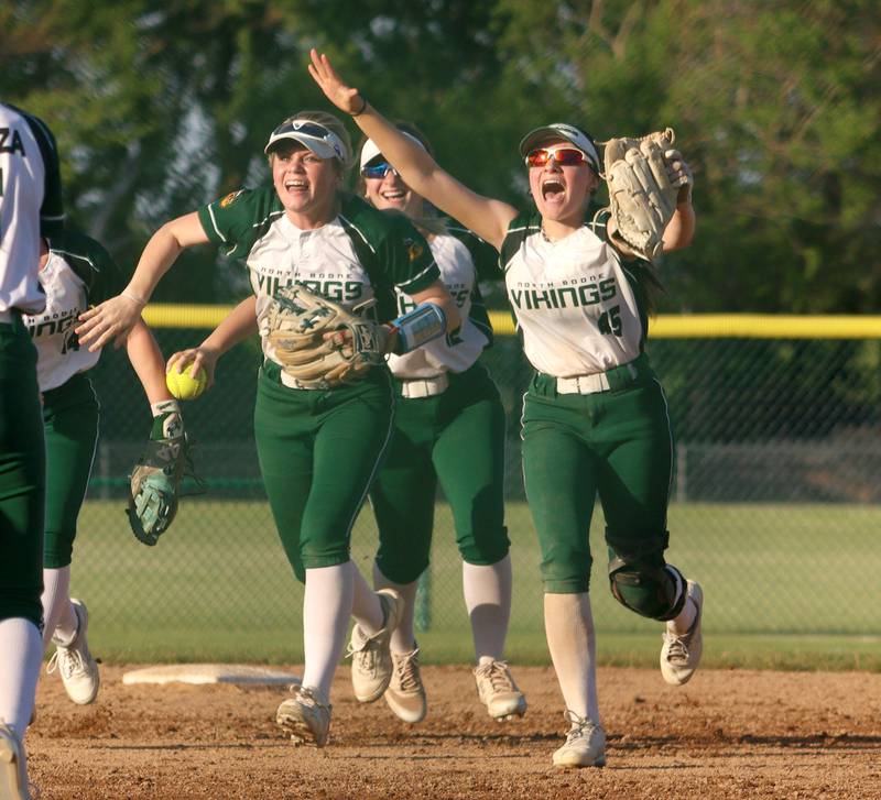 North Boone’s Vikings celebrate a win in IHSA Softball Class 2A Regional Championship action at Marengo Friday.