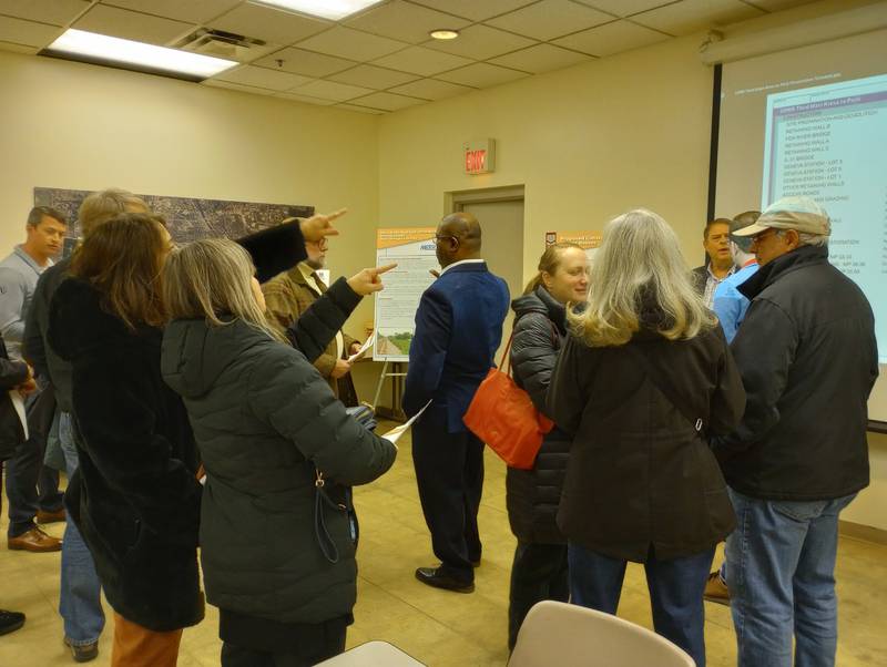 Geneva residents attend an open house Thursday night to get information about the Union Pacific Railroad third rail project in the city.