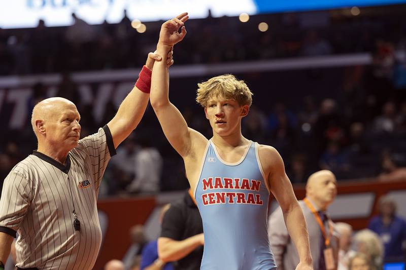 Marian’s Central’s Brayden Teunissen beat Carlye’s Tyson Waughtel in the 1A 120 pound championship match Saturday, Feb. 17, 2024 at the IHSA state wrestling finals at the State Farm Center in Champaign.