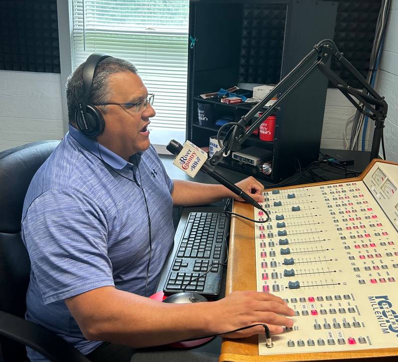 Sam Ramirez works behind the mic at River Country 101.7 FM on Tuesday, July 9, 2024. Ramirez will mark his 30th anniversary with the Dixon radio station with an on-air celebration from 6-10 a.m. Thursday, July 11, 2024.