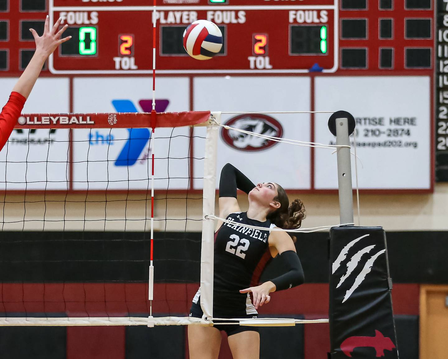 Plainfield North's Lindey Balsano (22) gathers for a kill during volleyball match between Naperville Central at Plainfield North.  Aug 28, 2024.