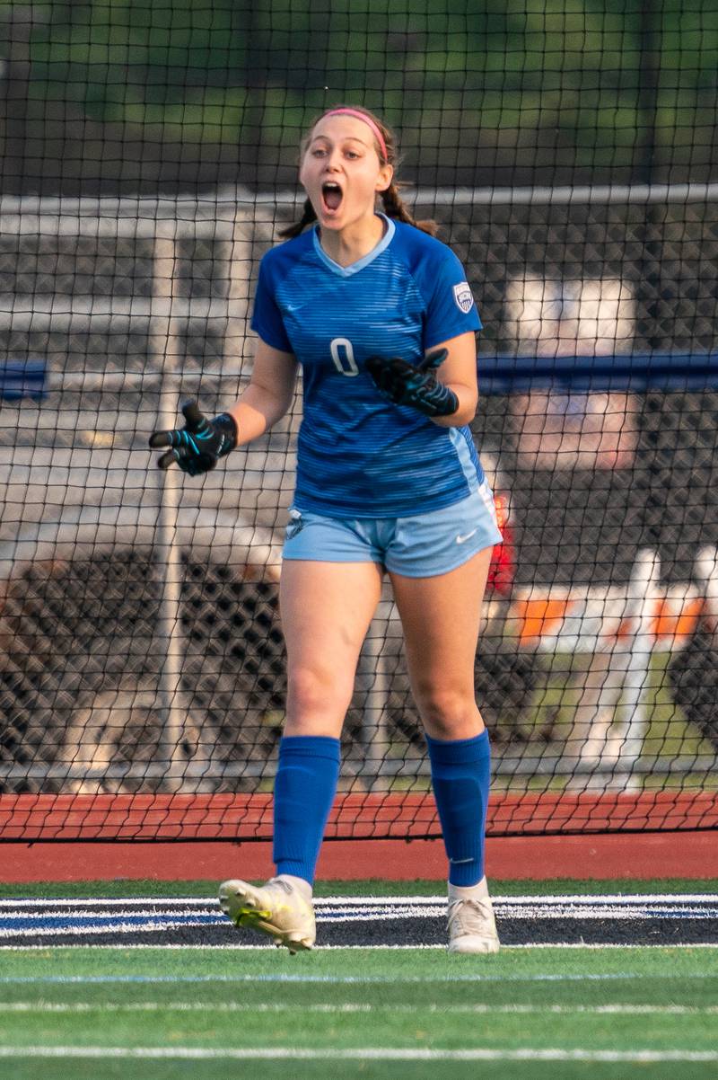 St. Charles North's Kara Claussner (0) shouts instructions to her defense during the Class 3A girls soccer regional final against Wheaton Warrenville South at St. Charles North High School on Friday, May 19, 2023.