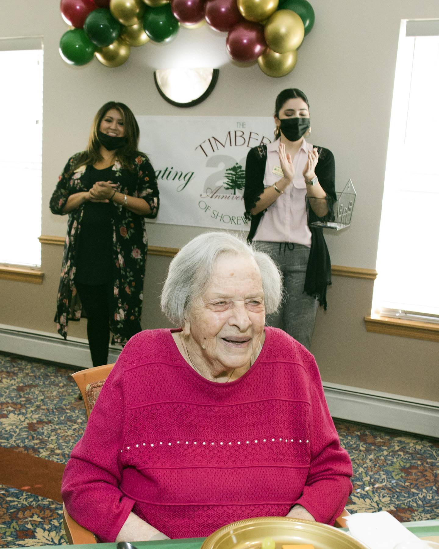 Timbers of Shorewood resident Jean Thuringer is seen during the Timbers of Shorewood 20th Anniversary on Thursday, October 13, 2022, in Shorewood, Ill.  Thuringer, age 102, is one of the original residents of the Timbers of Shorewood. Thuringer moved into the Timbers in 2002 and was queen of the "senior" prom in 2007.