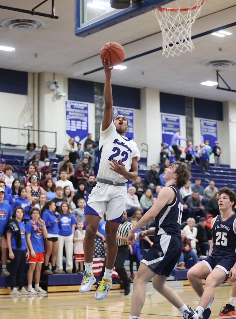 Riverside Brookfield's Steven Brown (22) goes for a layup during the boys varsity basketball game between IC Catholic Prep and Riverside Brookfield in Riverside on Tuesday, Jan. 24, 2023.