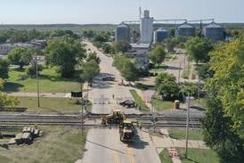 Photos: Crews replace train tracks on Route 178 in Utica