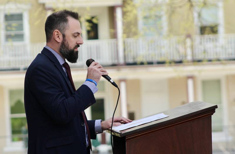 Charles Boostra, state's attorney for Lee County, spoke to a crowd of about 50 people on Friday, April 14, 2023, during an observance of National Child Abuse Prevention Month at the Old Lee County Courthouse.