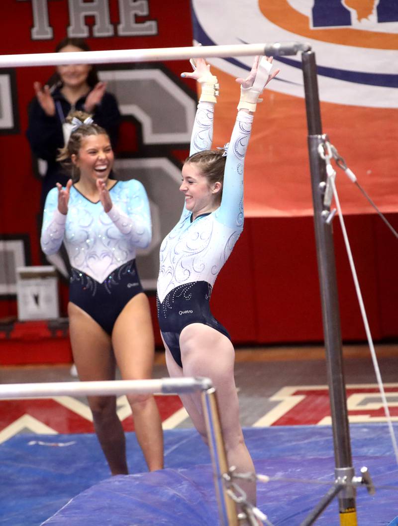 Lake Park’s Cali Keefe finishes her performance on the uneven parallel bars during the IHSA Girls State Gymnastics Meet at Palatine High School on Friday, Feb. 16, 2024.