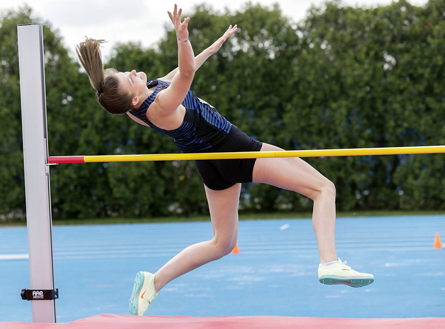 Woodstock’s Hallie Steponaitis clears the bar in the 2A high jump Saturday, May 18, 2024 at the IHSA girls state track meet in Charleston.